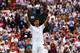 LONDON, ENGLAND - JULY 02: Novak Djokovic of Serbia celebrates after winning his Gentlemen's Singles quarter-final match against Marin Cilic of Croatia on day nine of the Wimbledon Lawn Tennis Championships at the All England Lawn Tennis and Croquet Club at Wimbledon on July 2, 2014 in London, England. (Photo by Clive Brunskill/Getty Images)