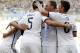 Germany's Mats Hummels (5) celebrates with his teammates after scoring his side's first goal during the World Cup quarterfinal soccer match between Germany and France at the Maracana Stadium in Rio de Janeiro, Brazil, Friday, July 4, 2014. (AP Photo/Matthias Schrader)