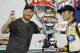 Dale Earnhardt Jr., left, takes a photo with NASCAR Nationwide series auto race winner Kasey Kahne at Daytona International Speedway in Daytona Beach, Fla., Friday, July 4, 2014. (AP Photo/Terry Renna)
