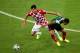 RECIFE, BRAZIL - JUNE 23: Dejan Lovren of Croatia fights off Giovani dos Santos of Mexico during the 2014 FIFA World Cup Brazil Group A match between Croatia and Mexico at Arena Pernambuco on June 23, 2014 in Recife, Brazil. (Photo by Laurence Griffiths/Getty Images)