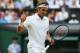 LONDON, ENGLAND - JULY 02: Roger Federer of Switzerland celebrates during his Gentlemen's Singles quarter-final match against Stan Wawrinka of Switzerland on day nine of the Wimbledon Lawn Tennis Championships at the All England Lawn Tennis and Croquet Club at Wimbledon on July 2, 2014 in London, England. (Photo by Jan Kruger/Getty Images)