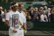 Roger Federer of Switzerland attends a practice session with his coach Stefan Edberg, right, at the All England Lawn Tennis Championships at Wimbledon, London, Saturday July 5, 2014. Federer will play in the men's singles final against Novak Djokovic of Serbia on Sunday. (AP Photo/Ben Curtis)