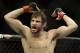Jon Fitch reacts during a UFC mixed martial arts match against Thiago Alves in Oakland, California, Saturday, August 7, 2010. Fitch won by unanimous decision. (AP Photo/Jeff Chiu)