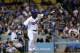 LOS ANGELES, CA - SEPTEMBER 12: Yasiel Puig #66 of the Los Angeles Dodgers throws his bat as he watches his RBI double to break a 1-1 tie in the seventh inning against the San Francisco Giants at Dodger Stadium on September 12, 2013 in Los Angeles, California. (Photo by Stephen Dunn/Getty Images)