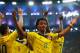 RIO DE JANEIRO, BRAZIL - JUNE 28: Juan Guillermo Cuadrado of Colombia celebrates his team's second goal scored by James Rodriguez (L) during the 2014 FIFA World Cup Brazil round of 16 match between Colombia and Uruguay at Maracana on June 28, 2014 in Rio de Janeiro, Brazil. (Photo by Clive Rose/Getty Images)