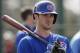 FILE - In this Feb. 21, 2014 file photo, Chicago Cubs third baseman Kris Bryant prepares to take batting practice during spring training baseball practice in Mesa, Ariz. Bryant, 22, is a big-time prospect. (AP Photo/Rick Scuteri, File)