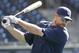 San Diego Padres third baseman Chase Headley rehearses his swing during batting practice prior to a baseball game against the Cincinnati Reds Monday, June 30, 2014, in San Diego. (AP Photo/Lenny Ignelzi)