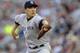 MINNEAPOLIS, MN - JULY 3: Masahiro Tanaka #19 of the New York Yankees delivers a pitch against the Minnesota Twins during the second inning of the game on July 3, 2014 at Target Field in Minneapolis, Minnesota. (Photo by Hannah Foslien/Getty Images)
