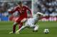 Real's Luka Modric fights for the ball with Bayern's Toni Kroos, left, during a first leg semifinal Champions League soccer match between Real Madrid and Bayern Munich at the Santiago Bernabeu stadium in Madrid, Spain, Wednesday, April 23, 2014. (AP Photo/Andres Kudacki)