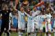 CORRECTS PHOTOGRAPHER'S BYLINE - Argentina's Lionel Messi and teammates celebrate at the end of the World Cup quarterfinal soccer match between Argentina and Belgium at the Estadio Nacional in Brasilia, Brazil, Saturday, July 5, 2014. Argentina won 1-0. (AP Photo/Eraldo Peres)