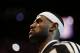 Miami Heat forward LeBron James during the pre-game ceremony in Game 4 of the NBA basketball finals against the San Antonio Spurs, Thursday, June 12, 2014, in Miami. (AP Photo/Lynne Sladky)