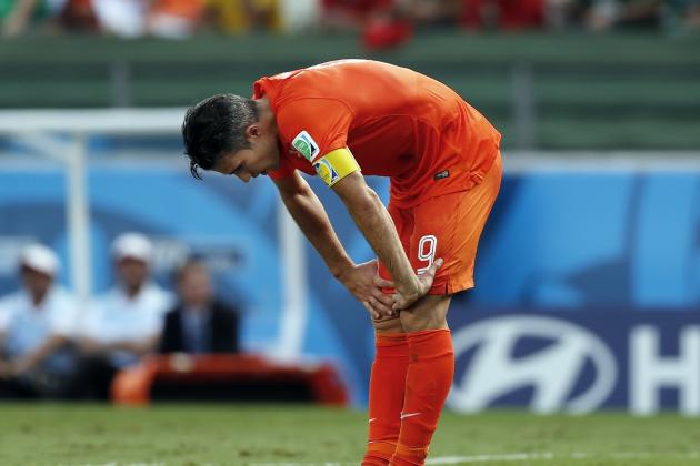 Netherlands' Robin van Persie bends over during the World Cup round of 16 soccer match between the Netherlands and Mexico at the Arena Castelao in Fortaleza, Brazil, Sunday, June 29, 2014. (AP Photo/Wong Maye-E)