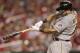 Pittsburgh Pirates' Pedro Alvarez (24) connects for a single in the second inning of a baseball game against the St. Louis Cardinals, Monday, July 7, 2014 in St. Louis. (AP Photo/Tom Gannam)