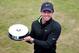 ABERDEEN, SCOTLAND - JULY 10: Rory McIlroy of Northern Ireland poses with the European Tour Shot of the Month award for May during the first round of the Aberdeen Asset Management Scottish Open at Royal Aberdeen on July 10, 2014 in Aberdeen, Scotland. (Photo by Andrew Redington/Getty Images)