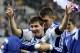 Argentina's Lionel Messi is hugged by a teammate after Argentina defeated the Netherlands 4-2 in a penalty shootout after a 0-0 tie after extra time to advance to the finals during the World Cup semifinal soccer match between the Netherlands and Argentina at the Itaquerao Stadium in Sao Paulo Brazil, Wednesday, July 9, 2014. (AP Photo/Victor R. Caivano)