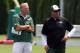 Jun 17, 2014; Florham Park, NJ, USA; New York Jets general manager John Idzik (left) and coach Rex Ryan during minicamp at Atlantic Health Training Center. Mandatory Credit: Noah K. Murray-USA TODAY Sports