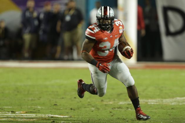 Ohio State running back Carlos Hyde (34) runs during the first half of the Orange Bowl NCAA college football game against Clemson, Friday, Jan. 3, 2014, in Miami Gardens, Fla. (AP Photo/Wilfredo Lee)