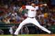 BOSTON, MA - JULY 08: Andrew Miller #30 of the Boston Red Sox pitches against the Chicago White Sox during the game at Fenway Park on July 8, 2014 in Boston, Massachusetts. (Photo by Jared Wickerham/Getty Images)