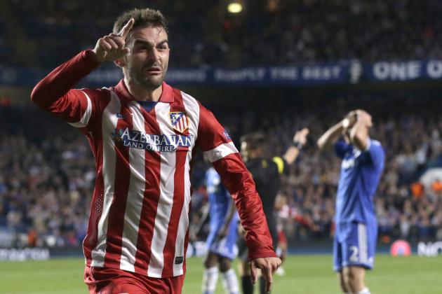 Atletico's Adrian Lopez celebrates after scoring his sides first goal of the game during the Champions League semifinal second leg soccer match between Chelsea and Atletico Madrid at Stamford Bridge stadium in London, Wednesday, April 30, 2014. (AP Photo/Matt Dunham)