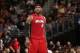 CLEVELAND, OH - MARCH 18: LeBron James #6 of the Miami Heat stands on the court against the Cleveland Cavaliers at The Quicken Loans Arena on March 18, 2014 in Cleveland, Ohio. NOTE TO USER: User expressly acknowledges and agrees that, by downloading and/or using this Photograph, user is consenting to the terms and conditions of the Getty Images License Agreement. Mandatory Copyright Notice: Copyright 2014 NBAE (Photo by Joe Murphy/NBAE via Getty Images)