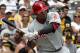 Philadelphia Phillies' Marlon Byrd singles home a run during the first inning of a baseball game off Pittsburgh Pirates starting pitcher Jeff Locke in Pittsburgh Sunday, July 6, 2014. The Pirates won 6-2. (AP Photo/Gene J. Puskar)