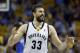Memphis Grizzlies center Marc Gasol celebrates a score against the Oklahoma City Thunder in the second half of Game 4 of an opening-round NBA basketball playoff series Sunday, April 27, 2014, in Memphis, Tenn. (AP Photo/Mark Humphrey)