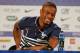 France's Patrice Evra smiles during a press conference at the Teatro Pedro II, in Ribeirao Preto, Brazil, Wednesday, June 18, 2014. France plays in group E of the 2014 Brazil soccer World Cup. (AP Photo/David Vincent)