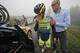 Spain's Alberto Contador abandons the race after crashing during the tenth stage of the Tour de France cycling race over 161.5 kilometers (100.4 miles) with start in Mulhouse and finish in La Planche des Belles Filles, France, Monday, July 14, 2014. At right is team manager Bjarne Riis of Denmark. (AP Photo/Christophe Ena)
