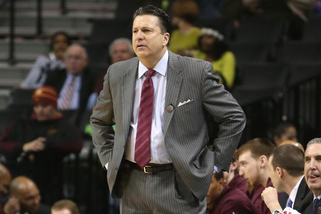 NEW YORK, NY - MARCH 12: Head coach Tom Pecora of the Fordham Rams looks on from the bench in the second half against the George Mason Patriots during the first round of the Atlantic 10 Men's Basketball Tournament at Barclays Center on March 12, 2014 in the Brooklyn Borough of New York City.  (Photo by Mike Lawrie/Getty Images)