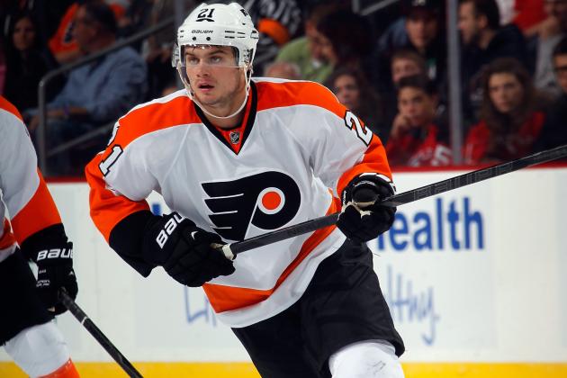 NEWARK, NJ - SEPTEMBER 26: Scott Laughton #21 of the Philadelphia Flyers skates against the New Jersey Devils at the Prudential Center on September 26, 2013 in Newark, New Jersey. The Devils defeated the Flyers 4-1. (Photo by Bruce Bennett/Getty Images)