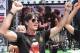 German national soccer coach Joachim Loew celebrates on stage at the German team victory ceremony , near the Brandenburg Gate in Berlin, Tuesday July 15, 2014. Germany's World Cup winners shared their fourth title with hundreds of thousands of fans by parading the trophy through cheering throngs to celebrate at the Brandenburg Gate on Tuesday. An estimated 400,000 people packed the