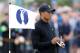 Tiger Woods of the US holds his scorecard after putting on the 11th green during a practice round ahead of the British Open Golf championship at the Royal Liverpool golf club, Hoylake, England, Tuesday July 15, 2014. The British Open Golf championship starts on Thursday July 17. (AP Photo/Peter Morrison)