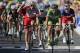 Norway's Alexander Kristoff, center left, crosses the finish line ahead of Peter Sagan of Slovakia, second right, and France's Arnaud Demare, right, to win the twelfth stage of the Tour de France cycling race over 185.5 kilometers (115.3 miles) with start in Bourg-en-Bresse and finish in Saint-Etienne, France, Thursday, July 17, 2014. (AP Photo/Peter Dejong)