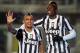 BERGAMO, ITALY - DECEMBER 22: Arturo Vidal (L) of Juventus celebrates with teamt-mate Paul Pogba after scoring their fourth goal during the Serie A match between Atalanta BC and Juventus at Stadio Atleti Azzurri d'Italia on December 22, 2013 in Bergamo, Italy. (Photo by Maurizio Lagana/Getty Images)