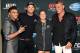 LAS VEGAS, NV - JULY 05: (L-R) Cast members from the upcoming movie 'The Expendables 3,' boxer Victor Ortiz, actor Kellan Lutz, UFC bantamweight champion and actress Ronda Rousey and actor Dolph Lundgren, attend the UFC 175 event at the Mandalay Bay Events Center on July 5, 2014 in Las Vegas, Nevada. Rousey defeated Alexis Davis by knockout 16 seconds into the evening's co-main event. (Photo by Ethan Miller/Getty Images)