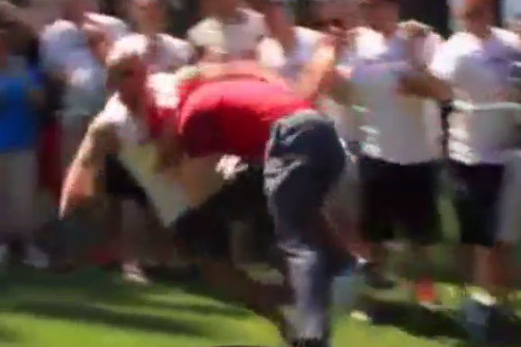 A.J. Hawk lays the wood on a fan at golf tournament