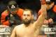 Johny Hendricks is announced to the crowd before a UFC 171 mixed martial arts welterweight title bout, Saturday, March 15, 2014, in Dallas. Hendricks won by decision. (AP Photo/Matt Strasen)