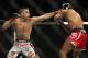 Jun 28, 2014; San Antonio, TX, USA; Ricardo Lamas (red gloves) fights Hacran Dias (blue gloves) in a Featherweight bout at UFC Fight Night 43 at AT&T Center. Mandatory Credit: Troy Taormina-USA TODAY Sports