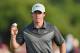 HOYLAKE, ENGLAND - JULY 18: Rory McIlroy of Northern Ireland celebrates a birdie putt on the 17th green during the second round of The 143rd Open Championship at Royal Liverpool on July 18, 2014 in Hoylake, England. (Photo by Stuart Franklin/Getty Images)