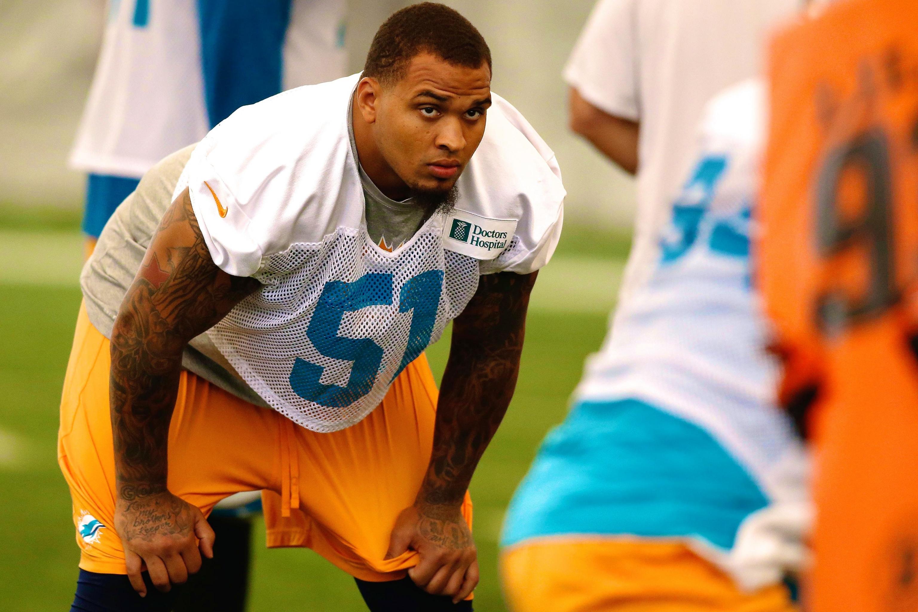 Miami Gardens, FL, USA. 8th Oct, 2017. Miami Dolphins center Mike Pouncey  (51) looks on as the offense struggled against the Titans. Miami Dolphins  vs. Tennessee Titans. Hard Rock Stadium, Miami Gardens