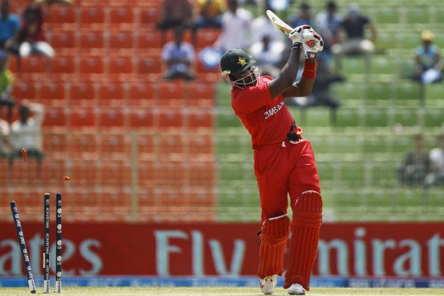 Zimbabwe's cricket player Hamilton Masakadza is bowled out by United Arab Emirates' Manjula Guruge during their ICC Twenty20 Cricket World Cup match in Sylhet, Bangladesh, Friday, March 21, 2014. (AP Photo/A.M. Ahad)