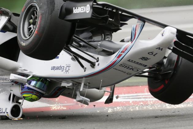 Williams driver Felipe Massa of Brazil crashes in the first curve of the German Formula One Grand Prix in Hockenheim, Germany, Sunday, July 20, 2014. (AP Photo/Petr David Josek)