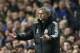 Chelsea's manager Jose Mourinho gestures to his team from the technical area during the Champions League semifinal second leg soccer match between Chelsea and Atletico Madrid at Stamford Bridge stadium in London, Wednesday, April 30, 2014. (AP Photo/Matt Dunham)