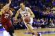 Mar 23, 2014; St. Louis, MO, USA; Kansas Jayhawks forward Perry Ellis (34) drives to the basket defended by Stanford Cardinal forward Dwight Powell (33) during the first half in the third round of the 2014 NCAA Men's Basketball Championship at Scottrade Center. Mandatory Credit: Scott Rovak-USA TODAY Sports