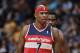 Washington Wizards forward Al Harrington takes court against the Denver Nuggets in the fourth quarter of the Nuggets' 105-102 victory in an NBA basketball game in Denver on Sunday, March 23, 2014. (AP Photo/David Zalubowski)