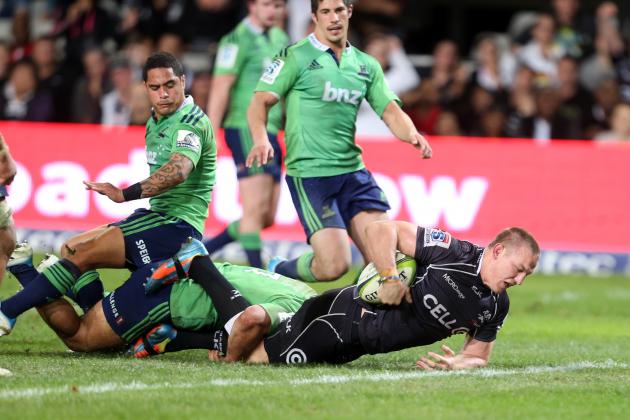 DURBAN, SOUTH AFRICA - JULY 19: Jean Deysel of the Cell C Sharks dropping the ball on the way to the try line during the Super Rugby match between Cell C Sharks and Highlanders at Growthpoint Kings Park on July 19, 2014 in Durban, South Africa. (Photo by Steve Haag/Gallo Images/Getty Images)