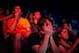 In this July 13, 2014 photo, a spectator peers out through his hands while watching the final moments of the championship game in the Red Bull Battle Grounds