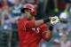 Texas Rangers' Alex Rios follows through on a double to left off a pitch from Houston Astros' Dallas Keuchel in the first inning of a baseball game, Wednesday, July 9, 2014, in Arlington, Texas. (AP Photo/Tony Gutierrez)