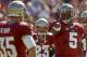 Florida State quarterback Jameis Winston (5) smiles as he points to tight end Nick O'Leary (35) before the start of an NCAA college football game against North Carolina State on Saturday, Oct. 26, 2013, in Tallahassee, Fla. Florida State beat North Carolina State 49-17. (AP Photo/Phil Sears)