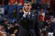 Villanova head coach Jay Wright calls out to his team during the second half of a third-round game against Connecticut in the NCAA men's college basketball tournament in Buffalo, N.Y., Saturday, March 22, 2014. Connecticut won the game 77-65. (AP Photo/Bill Wippert)